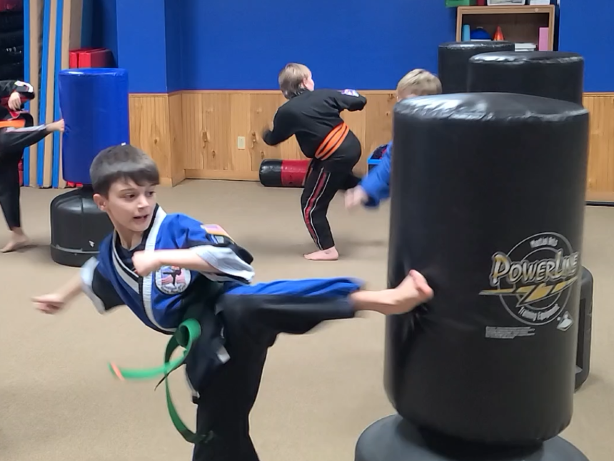 Kids practicing kicks